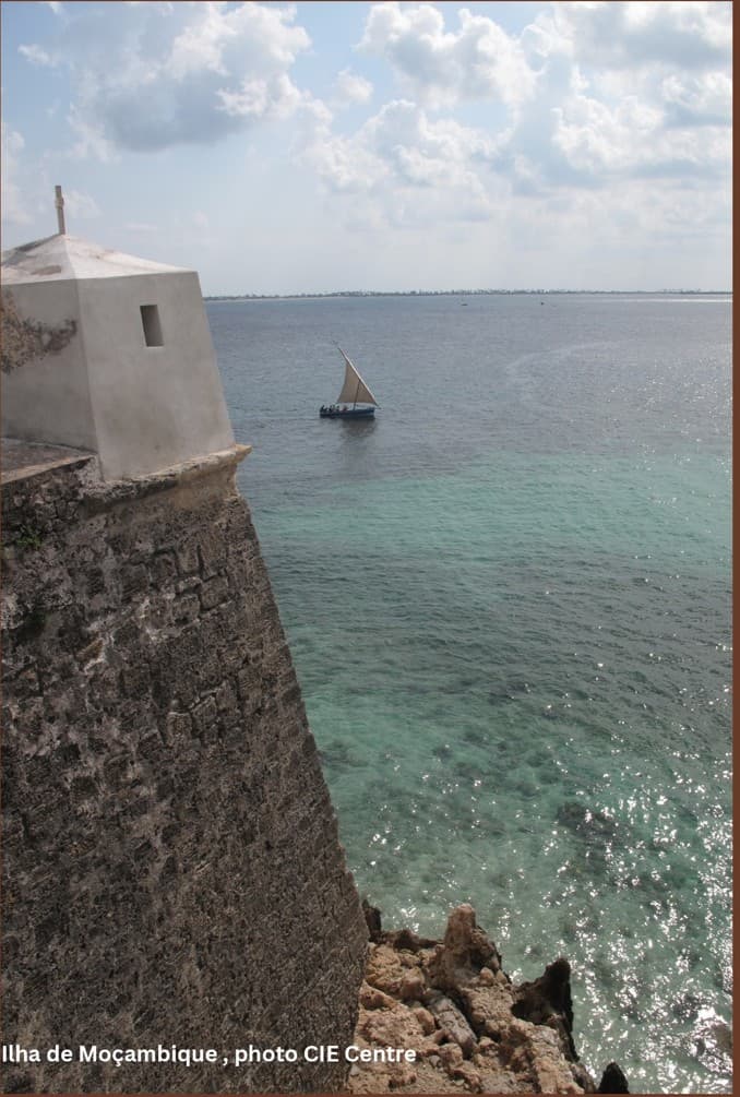 A sailing boat beside the fortified coast of Ilha de Moçambique